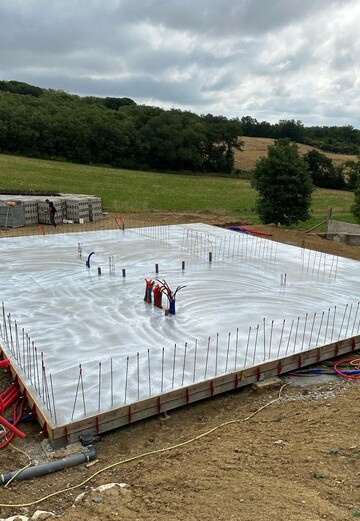 Coulage d’une dalle béton à Merville